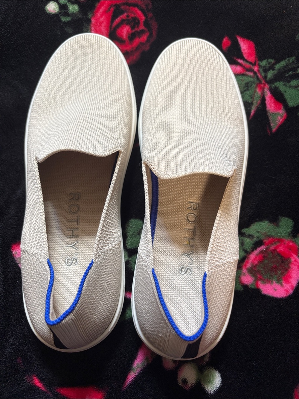 Rothy's Slip-On Knit Sneakers in Cream with Blue Trim